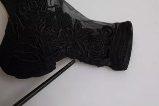 Botas negras de tul elástico con tacones hasta media pantorrilla