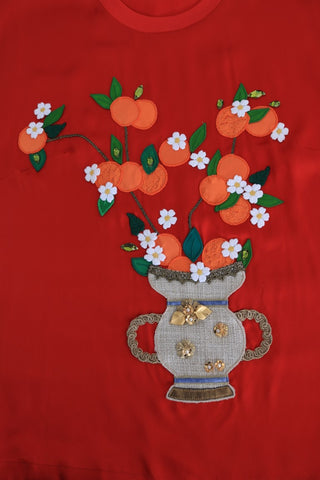 Blusa de cristal floral de seda roja con naranjas
