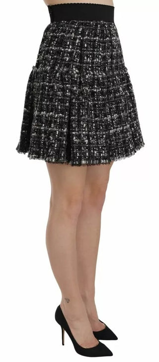 Minifalda negra de lana con volantes y estampado de cuadros