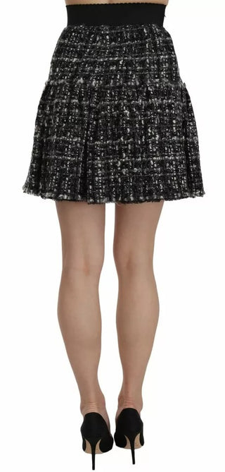 Minifalda negra de lana con volantes y estampado de cuadros