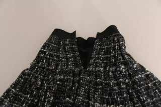 Minifalda negra de lana con volantes y estampado de cuadros