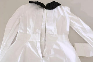 Camisa blusa con botones decorativos en negro y blanco