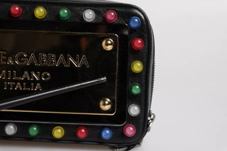 Bolso de mano negro con correa de muñeca LED y logo
