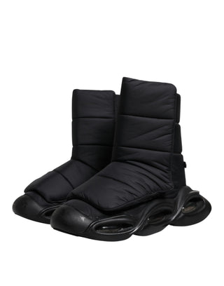 Schwarze Slip-On-Sneaker mit Wellen-Steppmuster