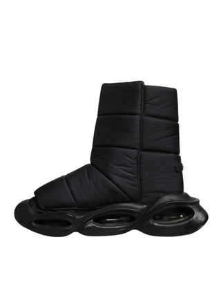 Schwarze Slip-On-Sneaker mit Wellen-Steppmuster