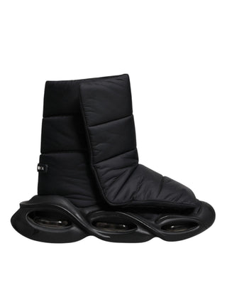Schwarze Slip-On-Sneaker mit Wellen-Steppmuster