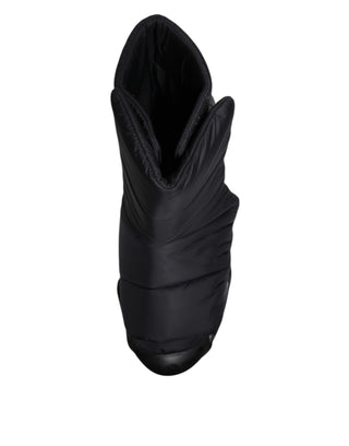 Schwarze Slip-On-Sneaker mit Wellen-Steppmuster