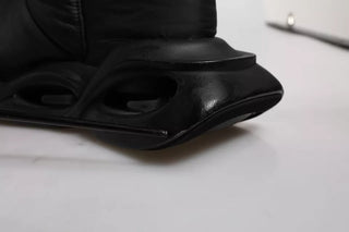 Schwarze Slip-On-Sneaker mit Wellen-Steppmuster