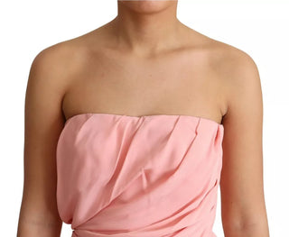 Vestido midi tubo rosa de seda elástica sin tirantes