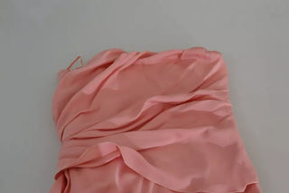 Vestido midi tubo rosa de seda elástica sin tirantes
