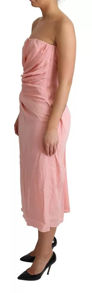 Vestido midi tubo rosa de seda elástica sin tirantes