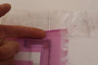 Chal envolvente de algodón rosa con rayas blancas