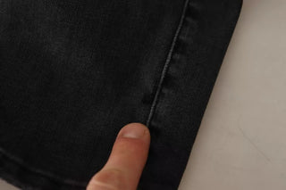 Jeans ajustados de mezclilla gris con logo y lycra para correr