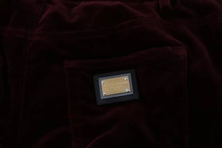 Pantalones ajustados de terciopelo burdeos con lycra