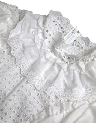 Blusa blanca de algodón con cuello alto y encaje
