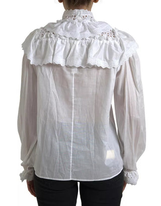 Blusa blanca de algodón con cuello alto y encaje