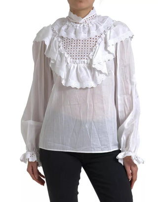Blusa blanca de algodón con cuello alto y encaje