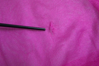 Blusa rosa transparente de manga larga y cuello redondo