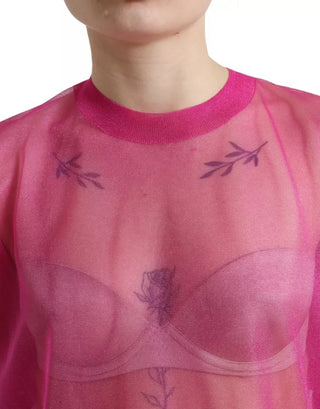Blusa rosa transparente de manga larga y cuello redondo