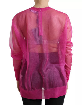 Blusa rosa transparente de manga larga y cuello redondo