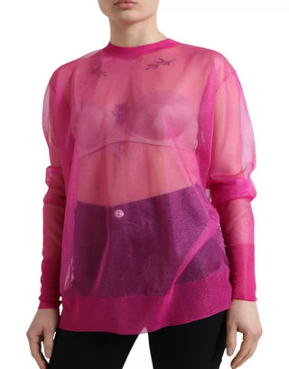 Blusa rosa transparente de manga larga y cuello redondo
