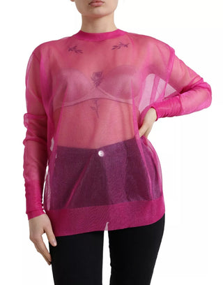 Blusa rosa transparente de manga larga y cuello redondo