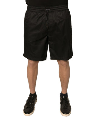 Shorts de poliéster negro tipo jersey de cintura media