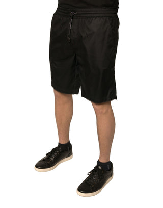 Shorts de poliéster negro tipo jersey de cintura media