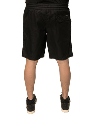 Shorts de poliéster negro tipo jersey de cintura media
