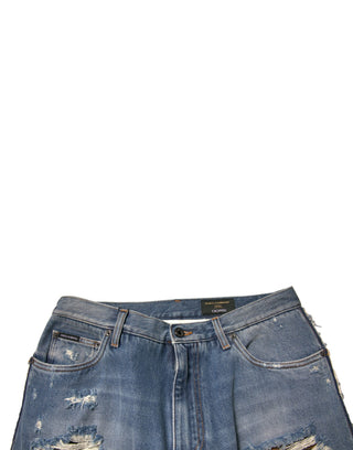 Jeans rectos azules desgastados y recortados