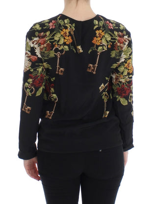 Blusa de Seda Negra con Estampado Floral de Llave