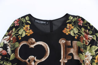 Blusa de Seda Negra con Estampado Floral de Llave