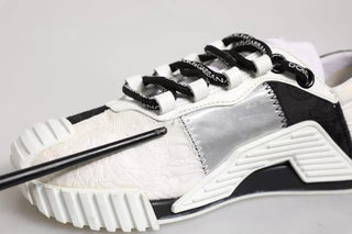 Zapatillas bajas NS1 blancas y negras