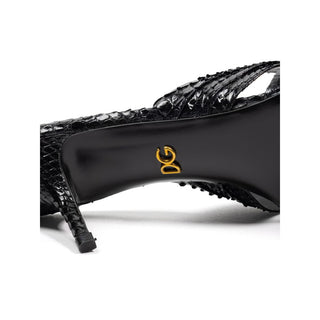Schwarze Plateau-Sandalen in Schlangenlederoptik