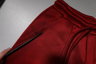 Bermudas de viscosa y nailon burdeos de cintura media