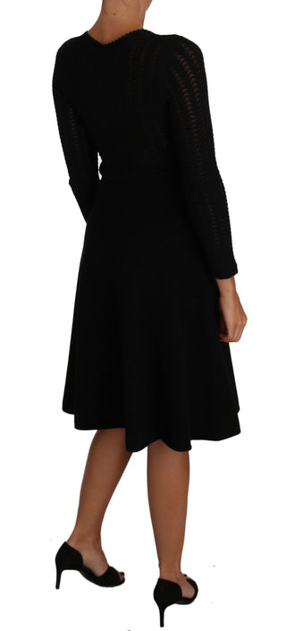 Vestido de corte recto de lana de punto negro con mangas largas