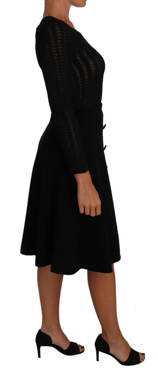 Vestido de corte recto de lana de punto negro con mangas largas