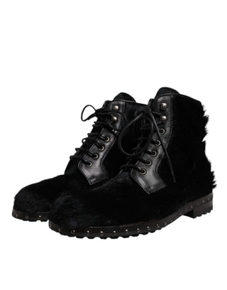 Botas negras de cuero estilo pony hasta media pantorrilla