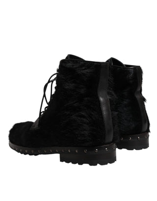 Botas negras de cuero estilo pony hasta media pantorrilla