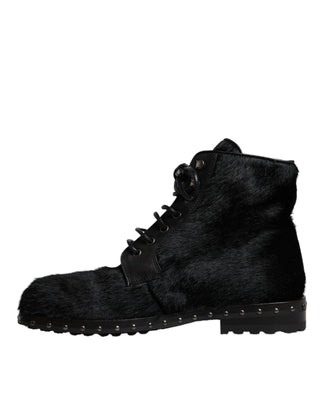Botas negras de cuero estilo pony hasta media pantorrilla