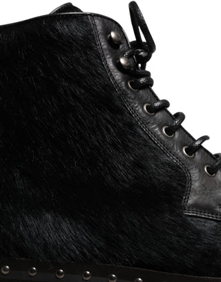 Botas negras de cuero estilo pony hasta media pantorrilla