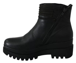 Botines negros de cuero con cremallera