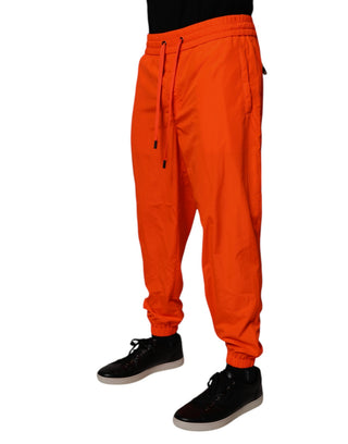 Pantalones jogger naranjas de poliéster para hombre