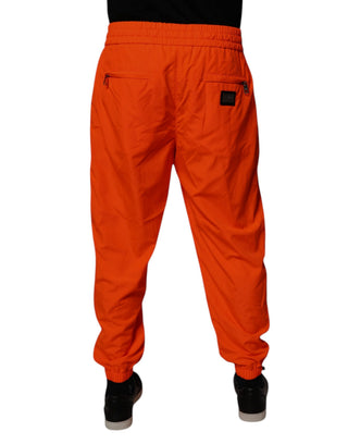 Pantalones jogger naranjas de poliéster para hombre