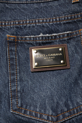 Jeans de mezclilla para hombre en algodón beige con flores azules