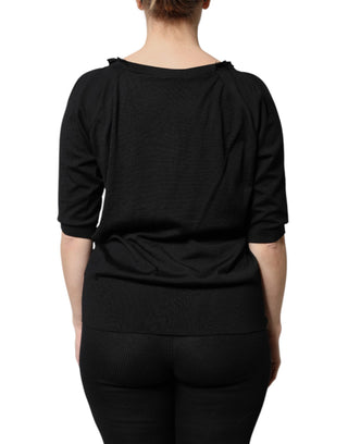 Blusa negra de manga corta con botones