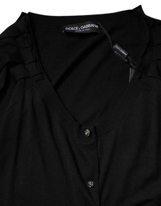 Blusa negra de manga corta con botones