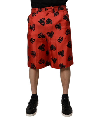 Orangefarbene Seiden-Bermudashorts mit Herzaufdruck