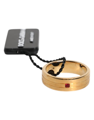 Goldfarbener Messingring mit roten Kristallen und DG Logo