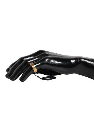 Goldfarbener Messingring mit roten Kristallen und DG Logo